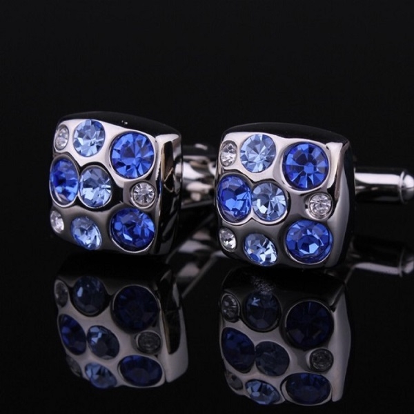 MANSJETTKNAPPER MED RUNDE BLÅ STENER